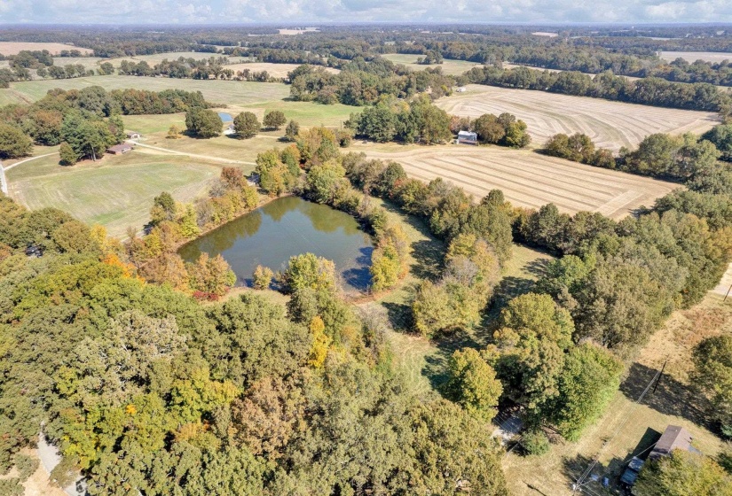 Drone / aerial view featuring a water view and a rural view