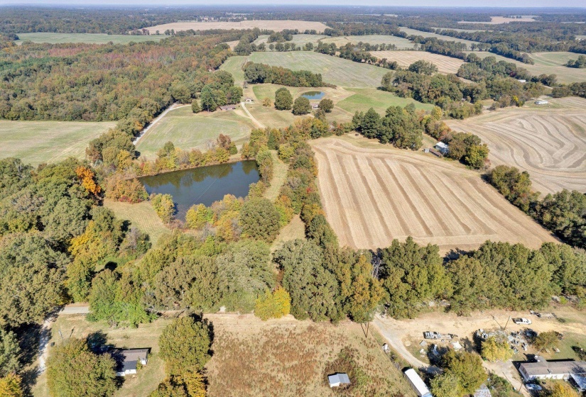 Aerial view with a water view and a rural view