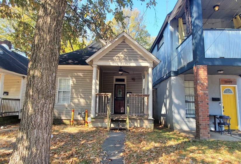 View of front of home featuring ceiling fan