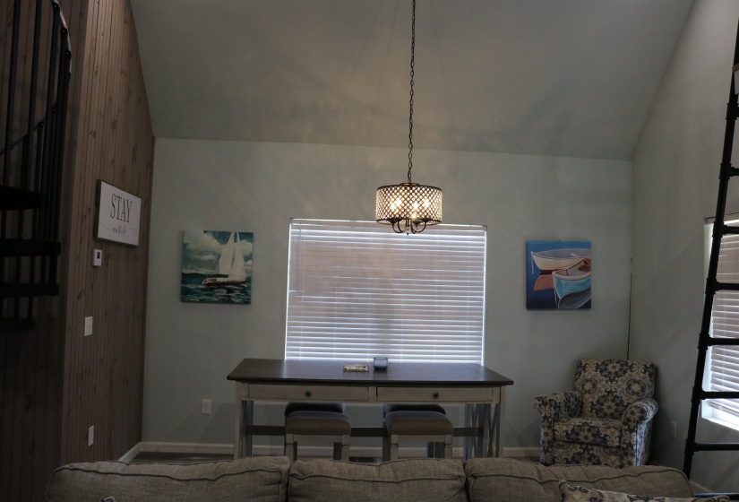 Dining room with vaulted ceiling
