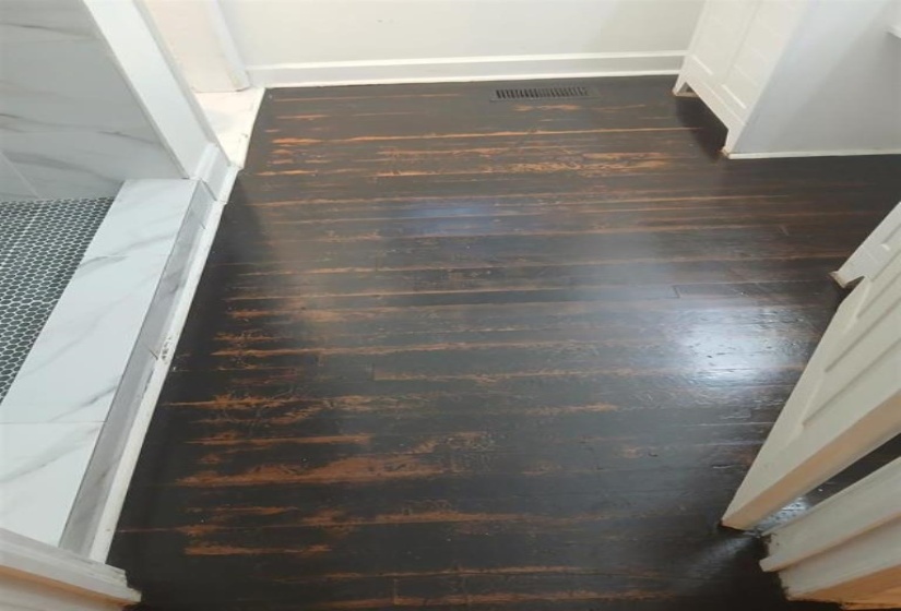 Room details with hardwood / wood-style flooring