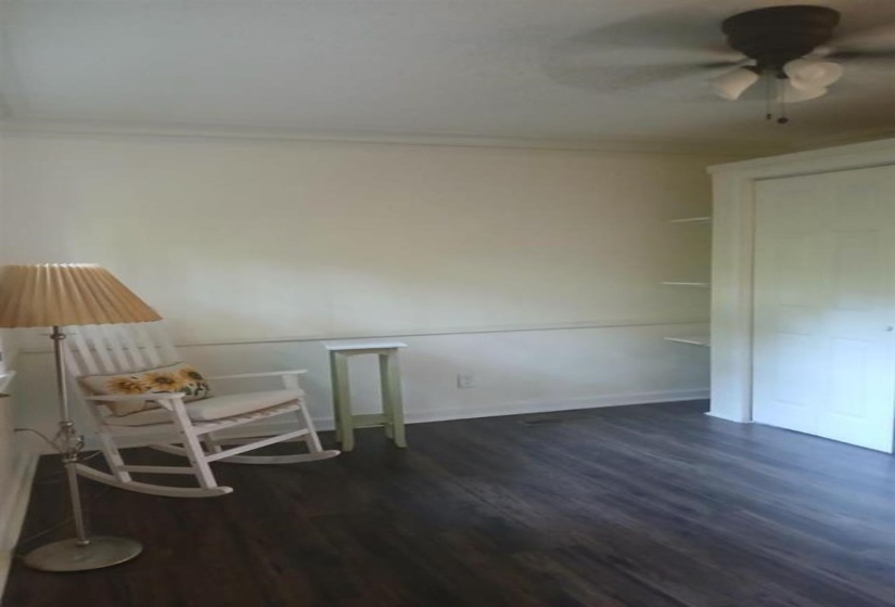 Unfurnished room featuring dark hardwood / wood-style flooring