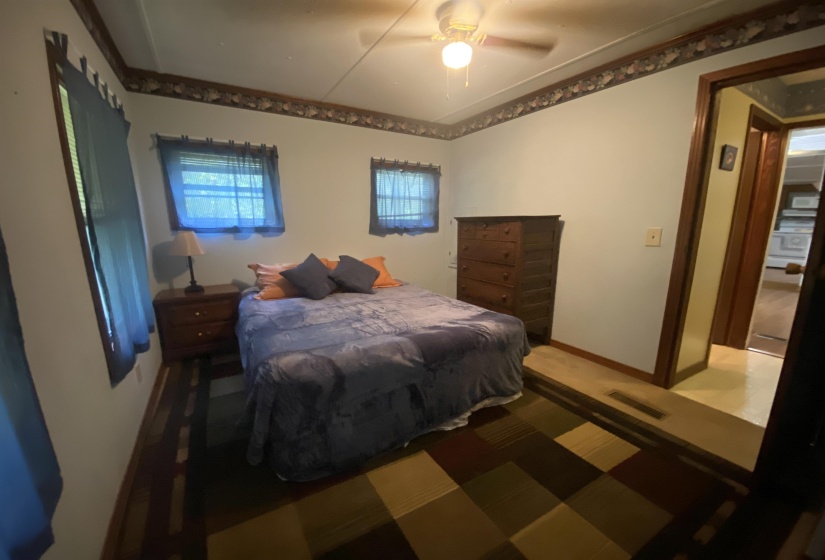 Bedroom featuring baseboards and a ceiling fan