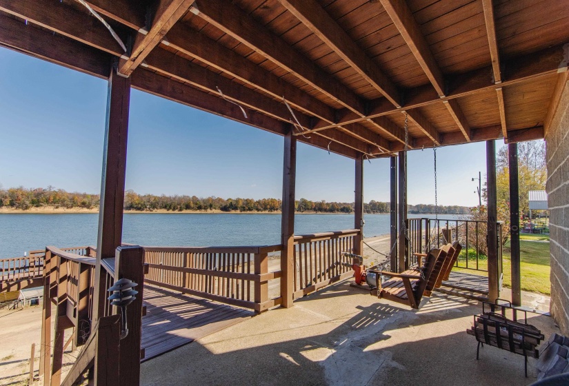 View of dock with a water view
