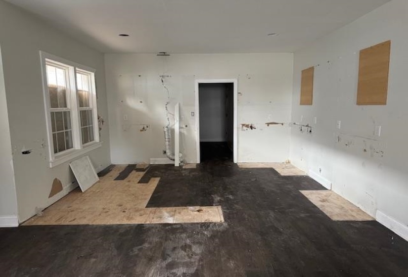 Unfurnished room with hardwood / wood-style floors