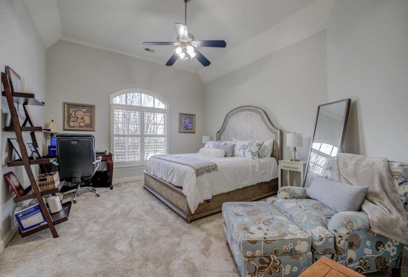 Third bedroom is upstairs.  This bedroom will use the hall bathroom.  It has carpet, a high ceiling, and a ceiling fan.