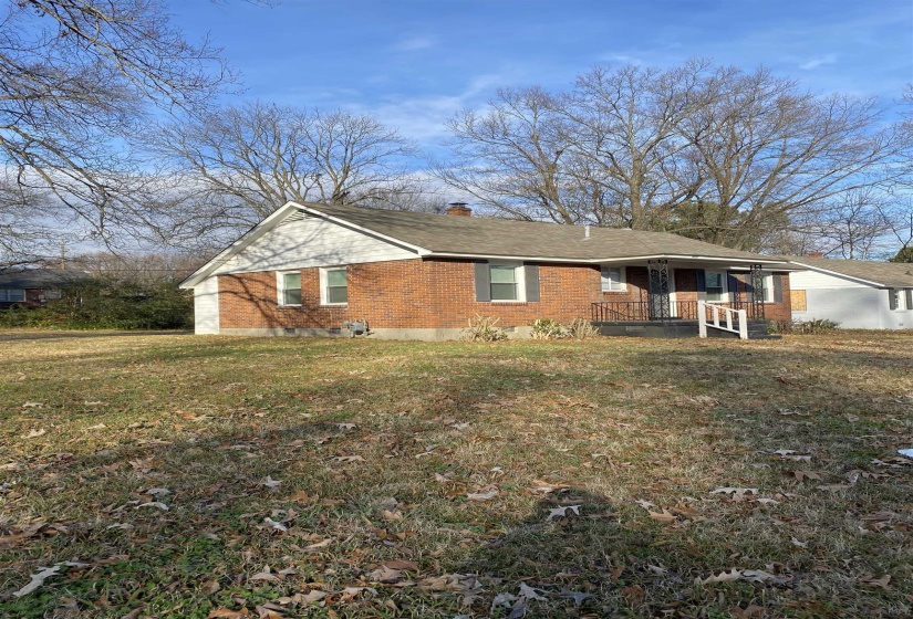 View of front of house with a front yard