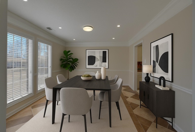 Dining space featuring ornamental molding, recessed lighting, and light tile patterned floors. This photo is digitally staged.