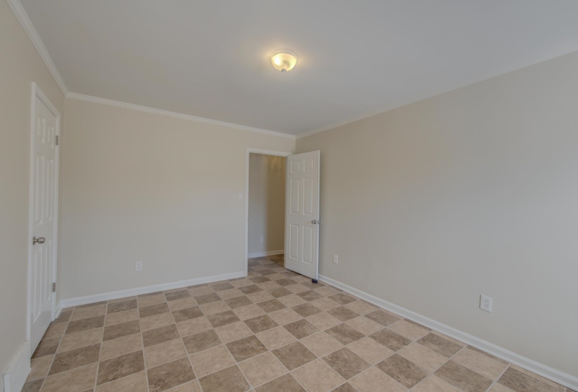 Unfurnished room with crown molding