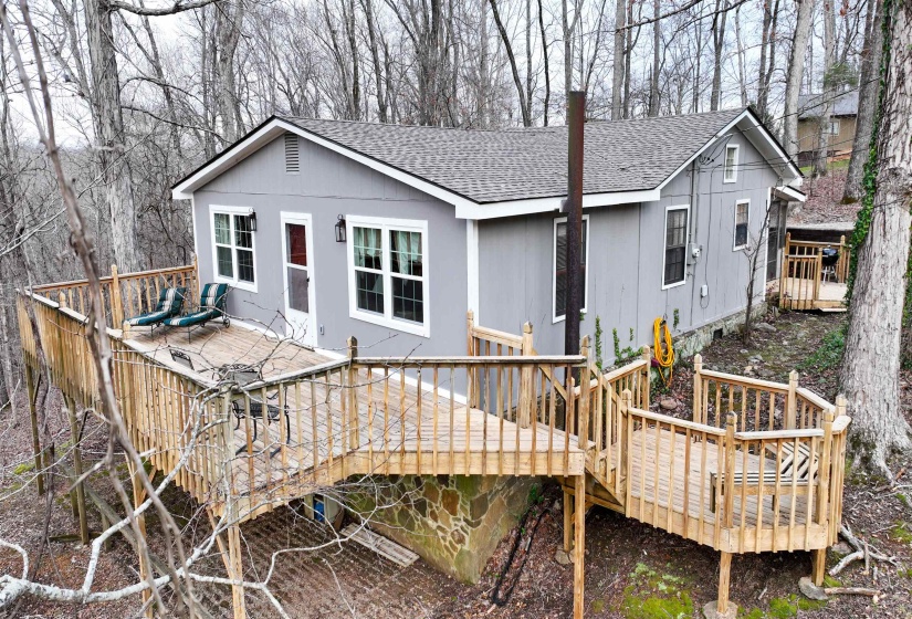 Back of property featuring a deck