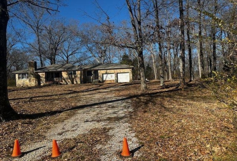 View of front of property featuring a garage