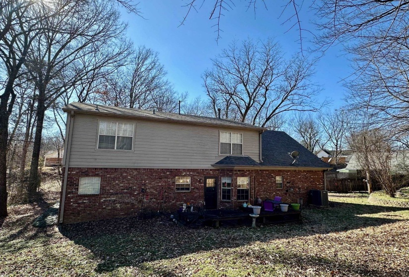 Back of property with central air condition unit
