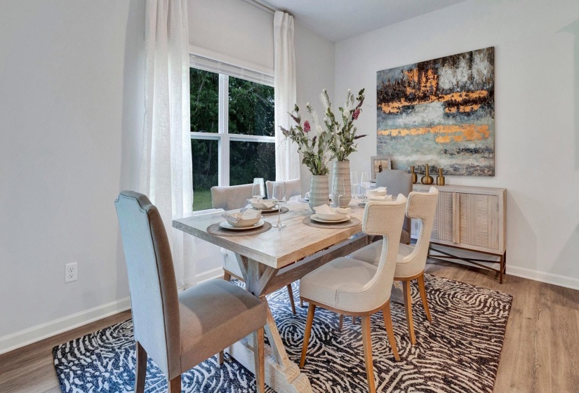 Dining area featuring hardwood / wood-style flooring