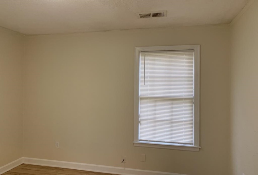 Empty room featuring light hardwood / wood-style floors