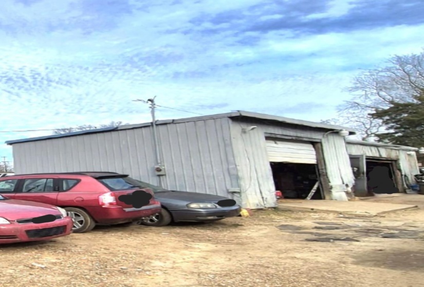 View of outdoor structure with a garage