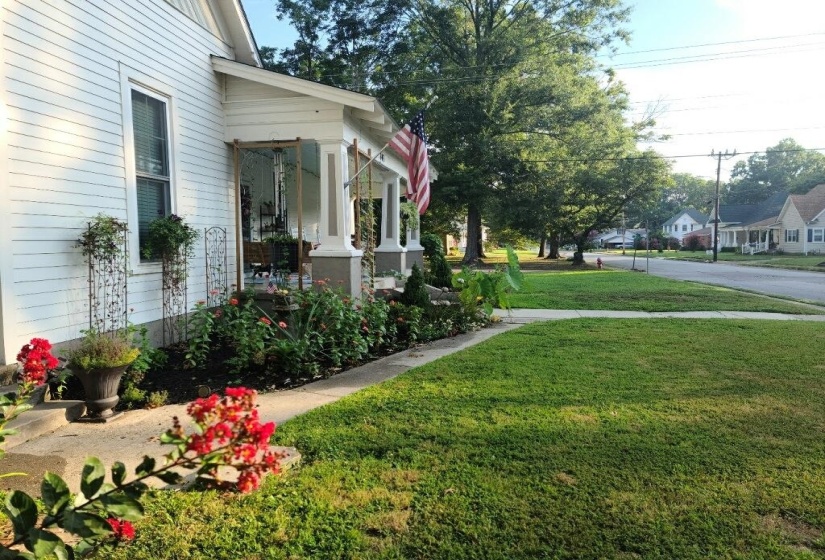 View of yard featuring a porch
