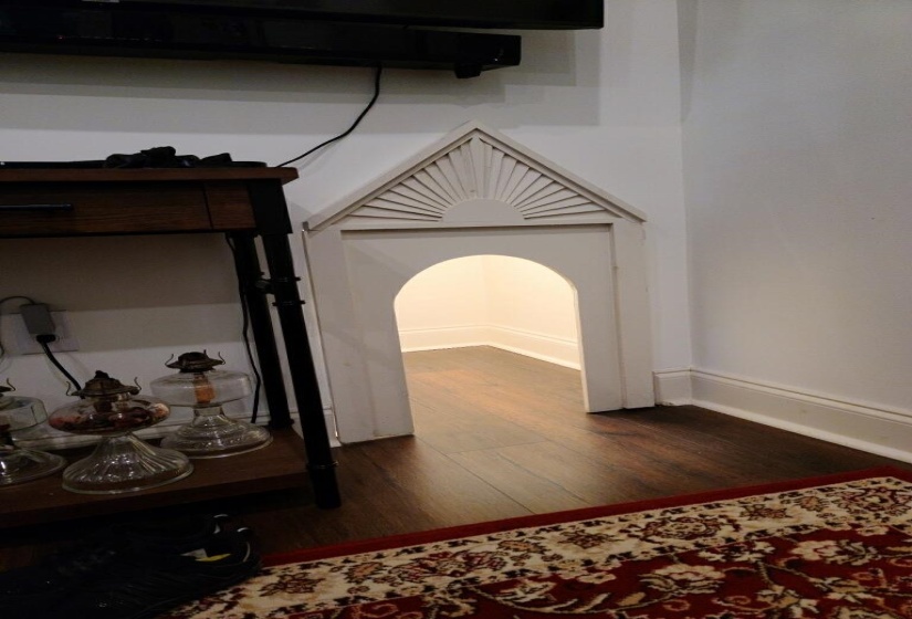 Detailed view of wood finished floors and baseboards