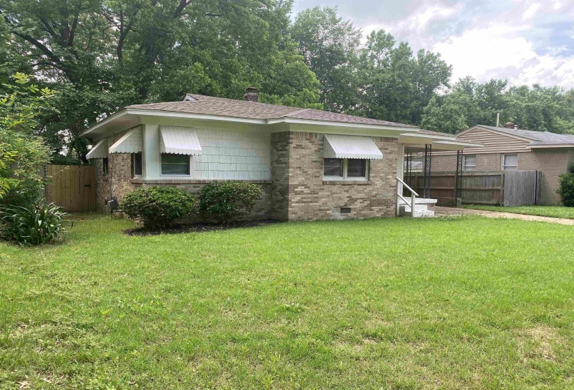View of front of home with a front yard