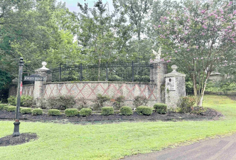 Community sign with a lawn