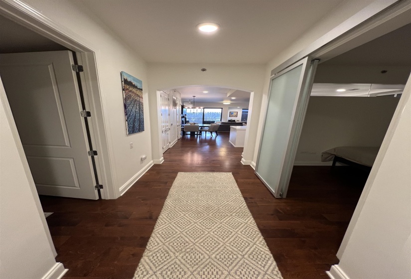 Hallway featuring dark hardwood / wood-style floors