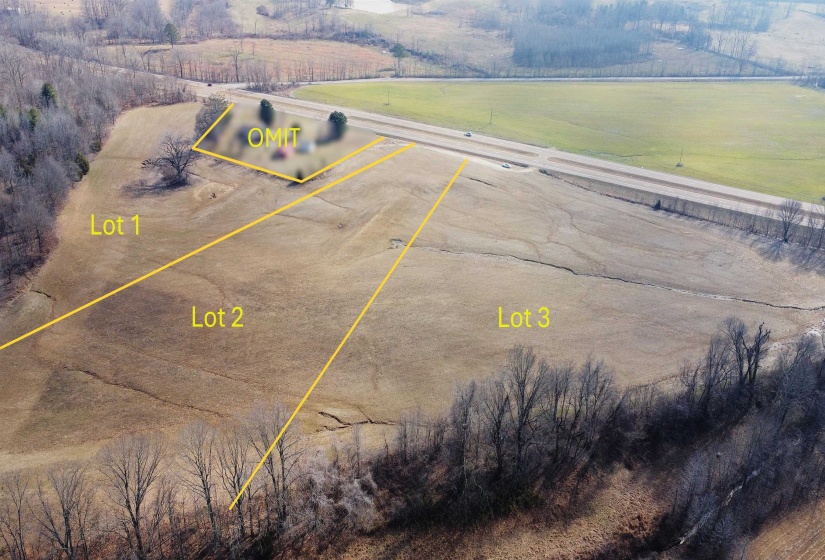 Birds eye view of property featuring a rural view