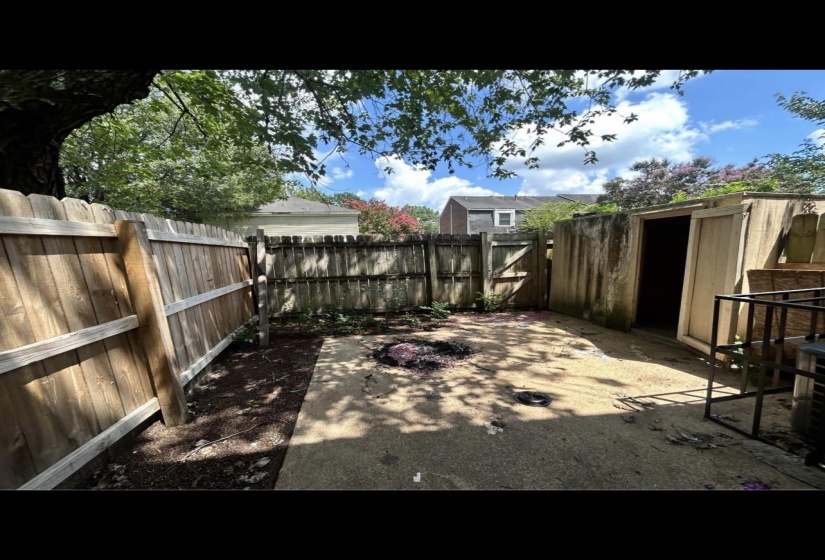 View of yard featuring a patio area and a fenced backyard