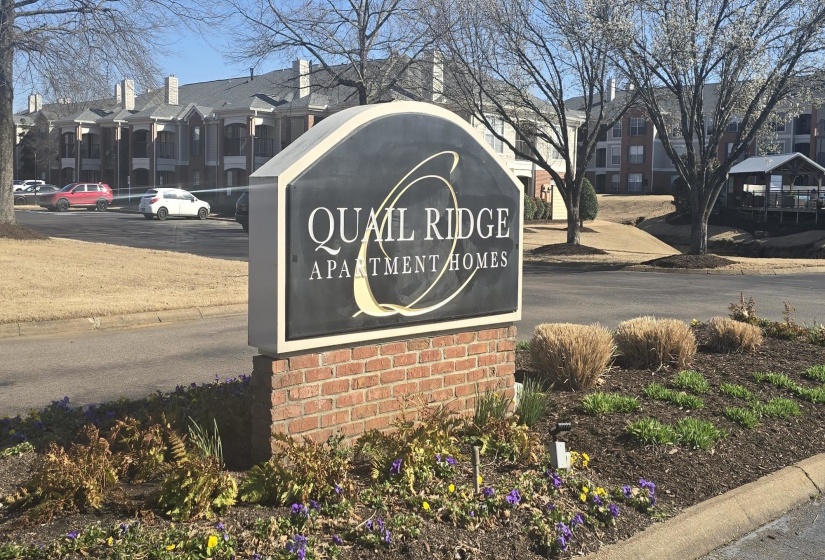 Community sign with a residential view