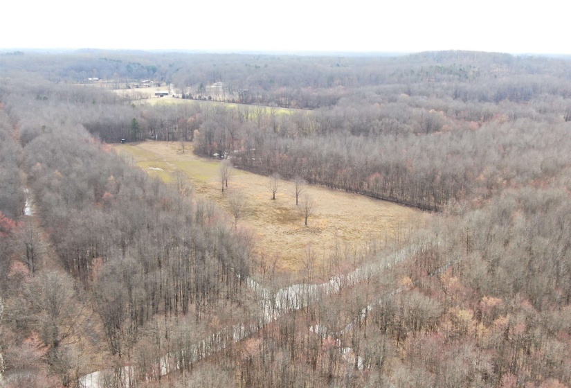 Bird's eye view with a rural view and a wooded view