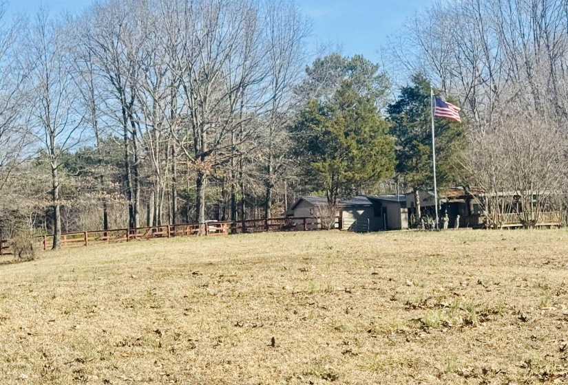 View of yard featuring fence