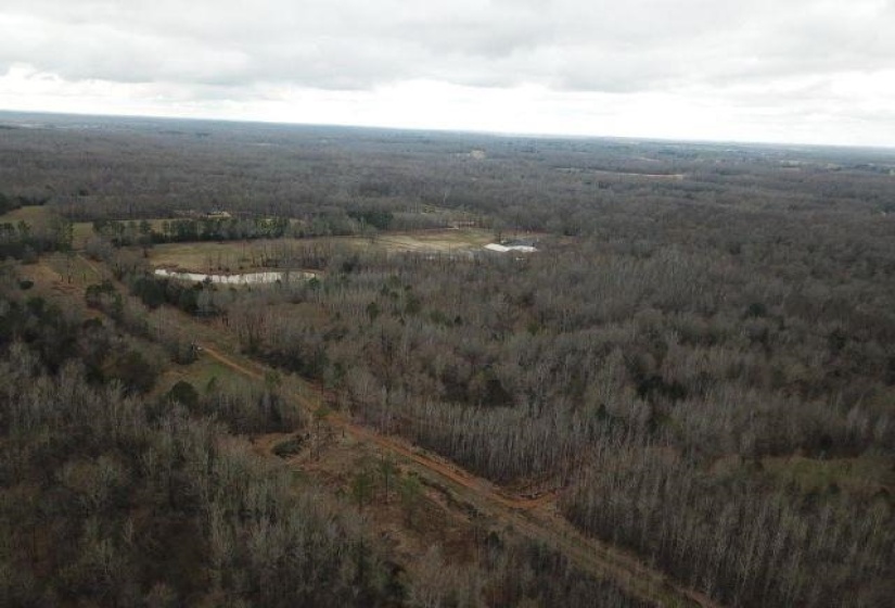 Birds eye view of property featuring a rural view