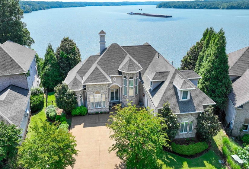View from above of property with a nearby body of water