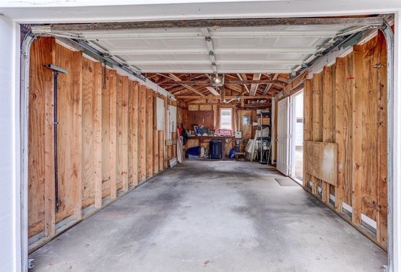 Garage featuring a garage door opener