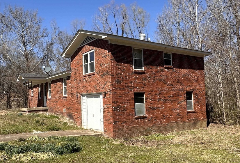 View of home's exterior featuring brick siding