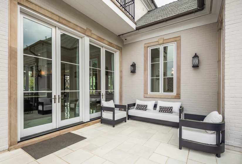 View of patio / terrace with a balcony and french doors