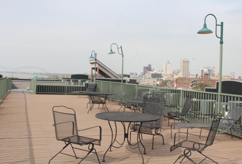 Wooden deck featuring a city view