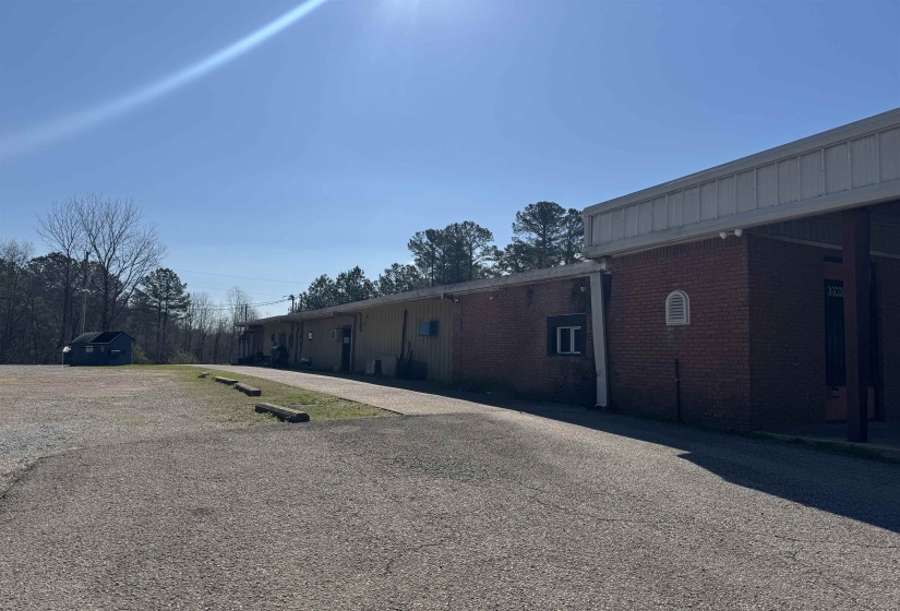 Exterior space with brick siding and driveway