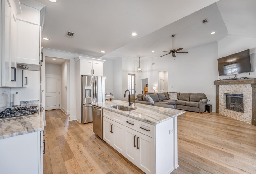 Kitchen featuring a sink, white cabinets, visible vents, and appliances with stainless steel finishes