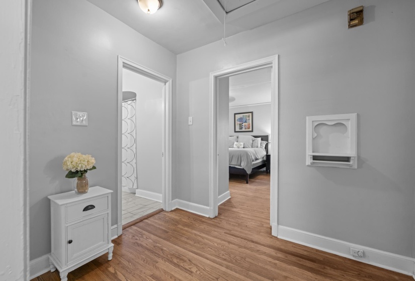 Hallway with views of guest bathroom and Bedroom 2