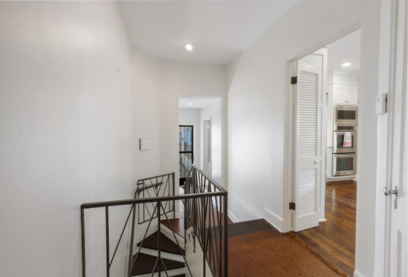 Also a Mudroom Hallway that leads to Back door access to Guest Quarters, Patio/Pond/Garden/Playing Area.