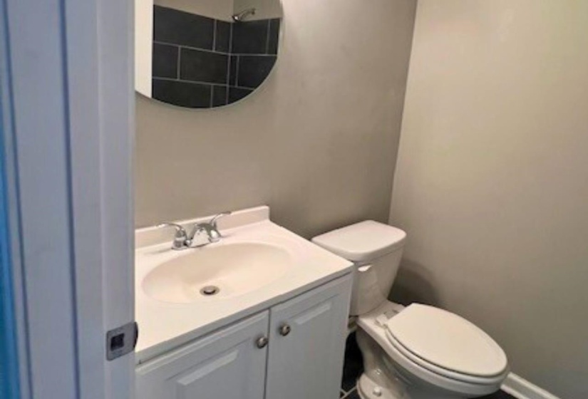 Bathroom with toilet and vanity