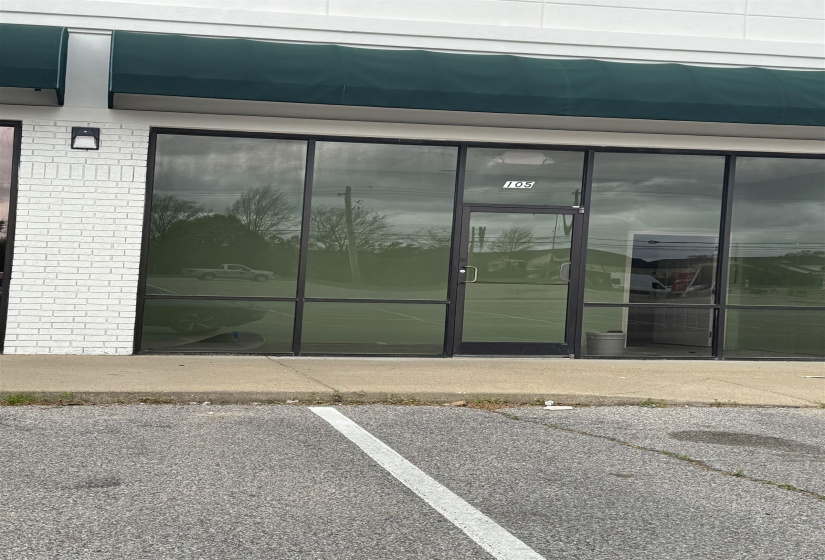 Entrance to property with uncovered parking