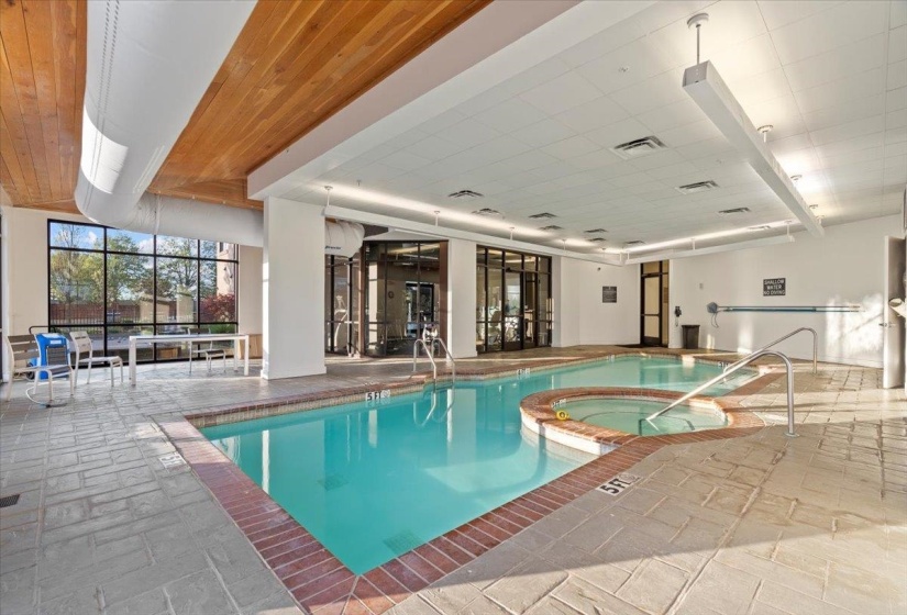 Pool with an indoor hot tub
