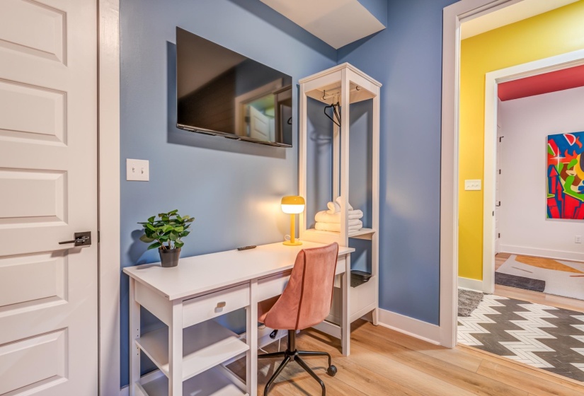 Office with baseboards and wood finished floors