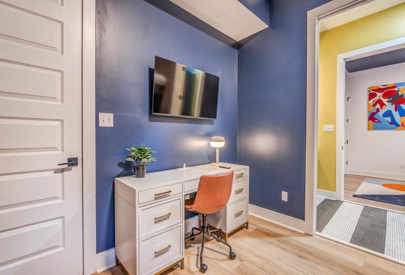 Office area featuring light wood finished floors and baseboards