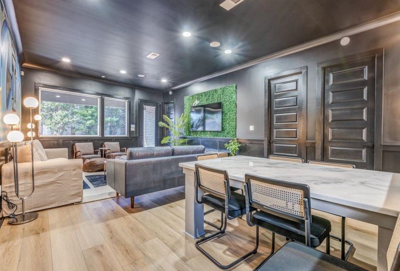 Interior space featuring recessed lighting, ornamental molding, visible vents, and light wood-type flooring