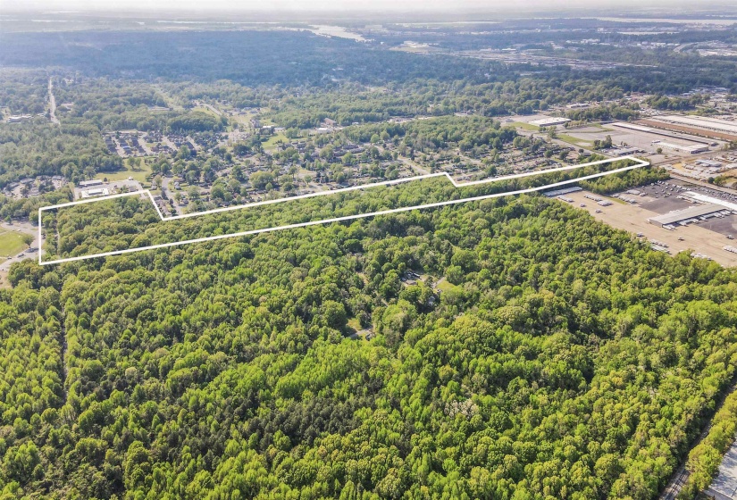 Bird's eye view with a wooded view