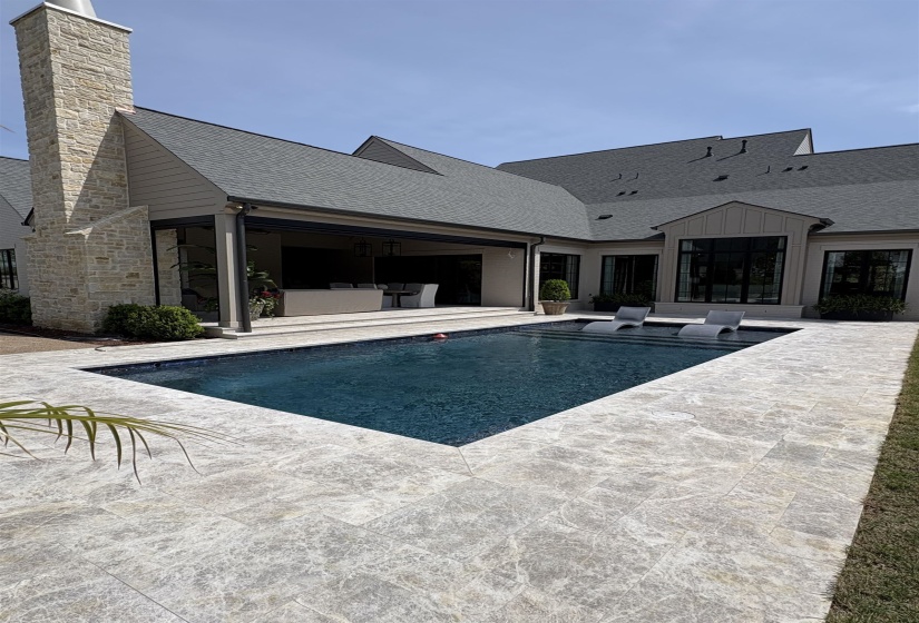 Pool featuring a patio area