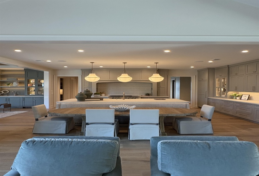 Interior space with wood finished floors and recessed lighting