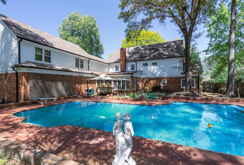 View of swimming pool with patio surround