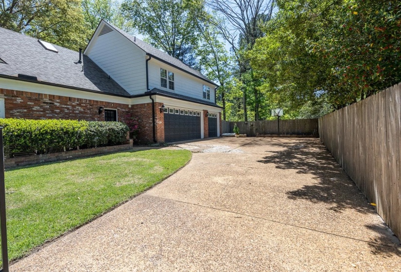 View of property exterior featuring brick siding, an attached garage, concrete driveway, and a shingled roof